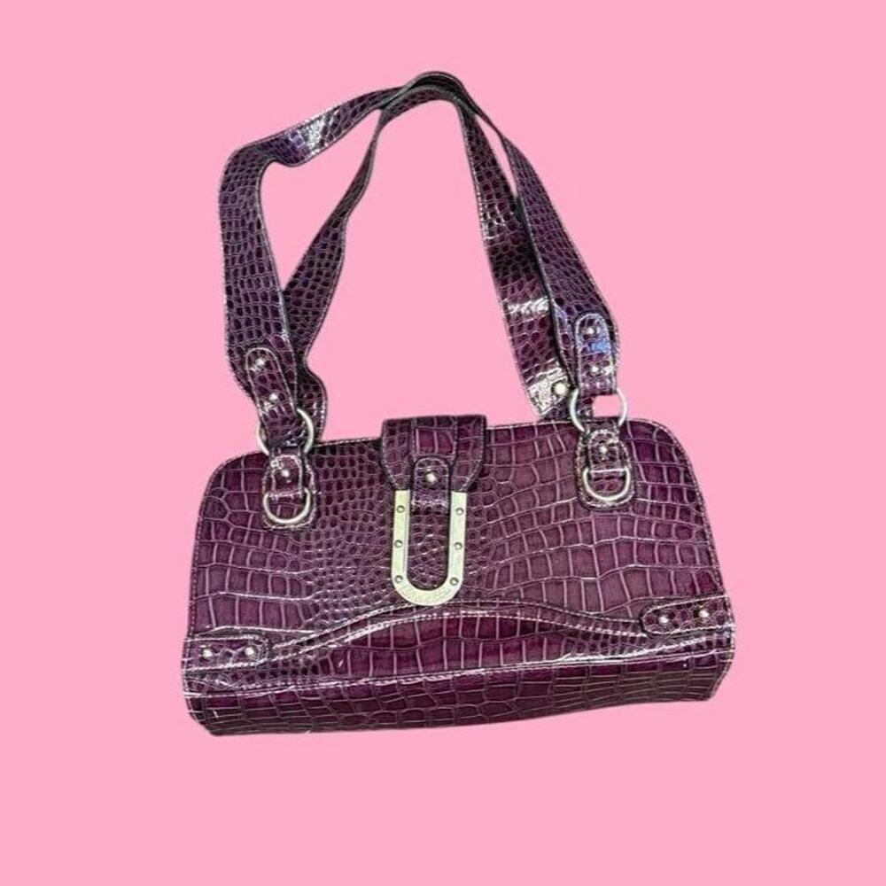 Purple crocodile textured handbag